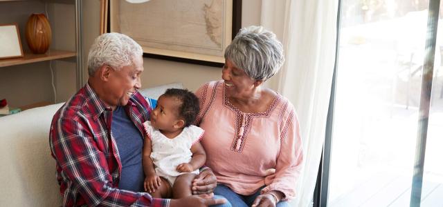 Retired Couple and Their Grandchild